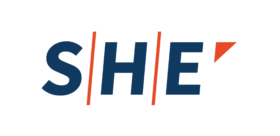 A logo featuring the word 'SHE' in bold blue letters, with a stylized red accent on the letter 'E.'