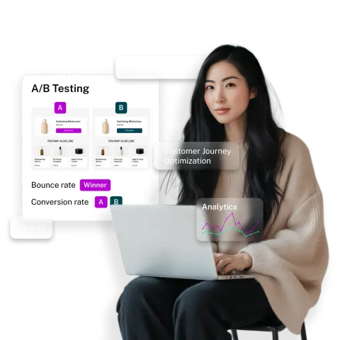 A woman in a beige sweater works on a laptop, analyzing A/B testing results and customer journey optimization data.